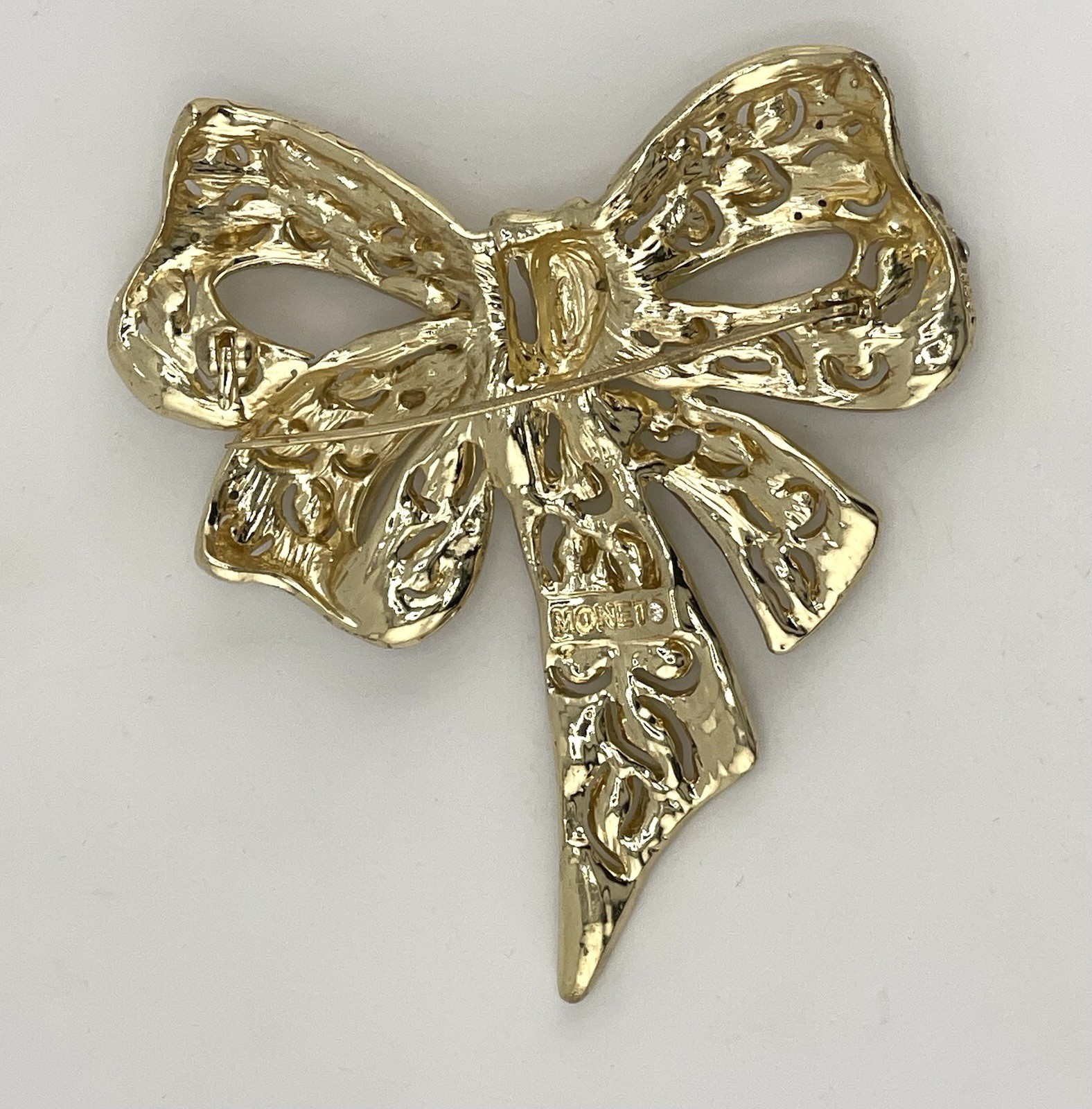 Vintage Monet Gold-Tone Rhinestone Bow Brooch -Statement Pavé Crystal Ribbon Pin