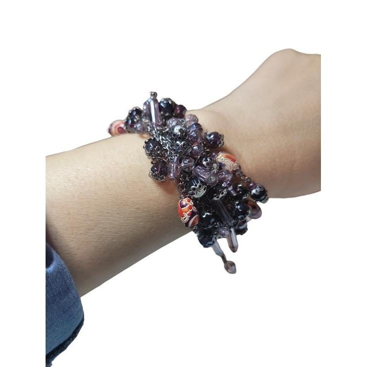 Striking vintage artisan beaded bracelet featuring a dramatic cluster fringe
