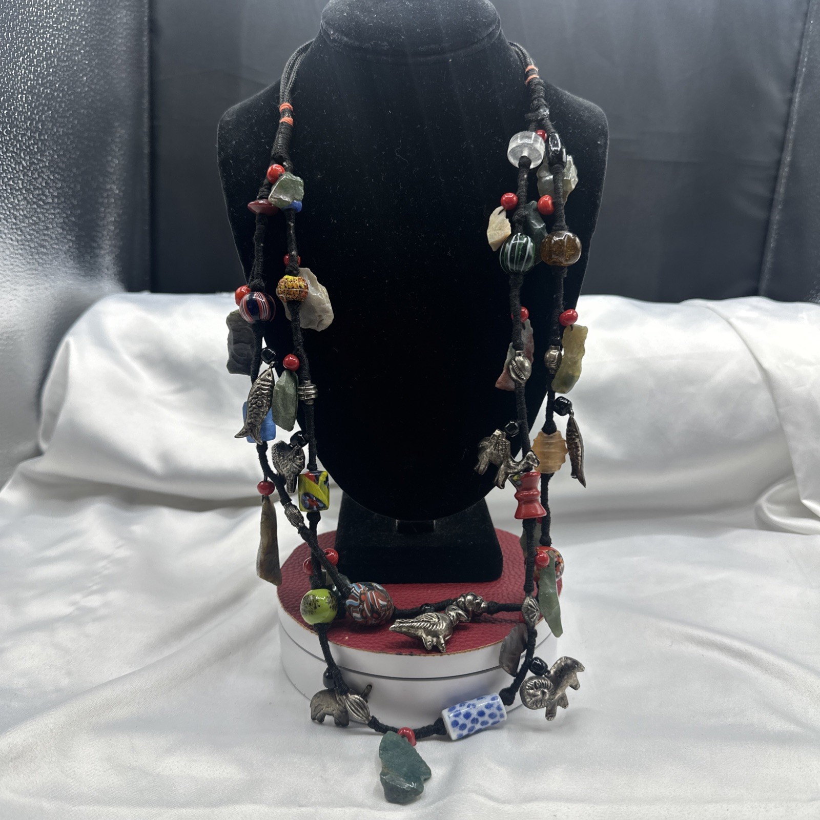 Vtg Indian Glass Beads Stone Nuggets and Seven Puffed Animals Cord Necklace.Read