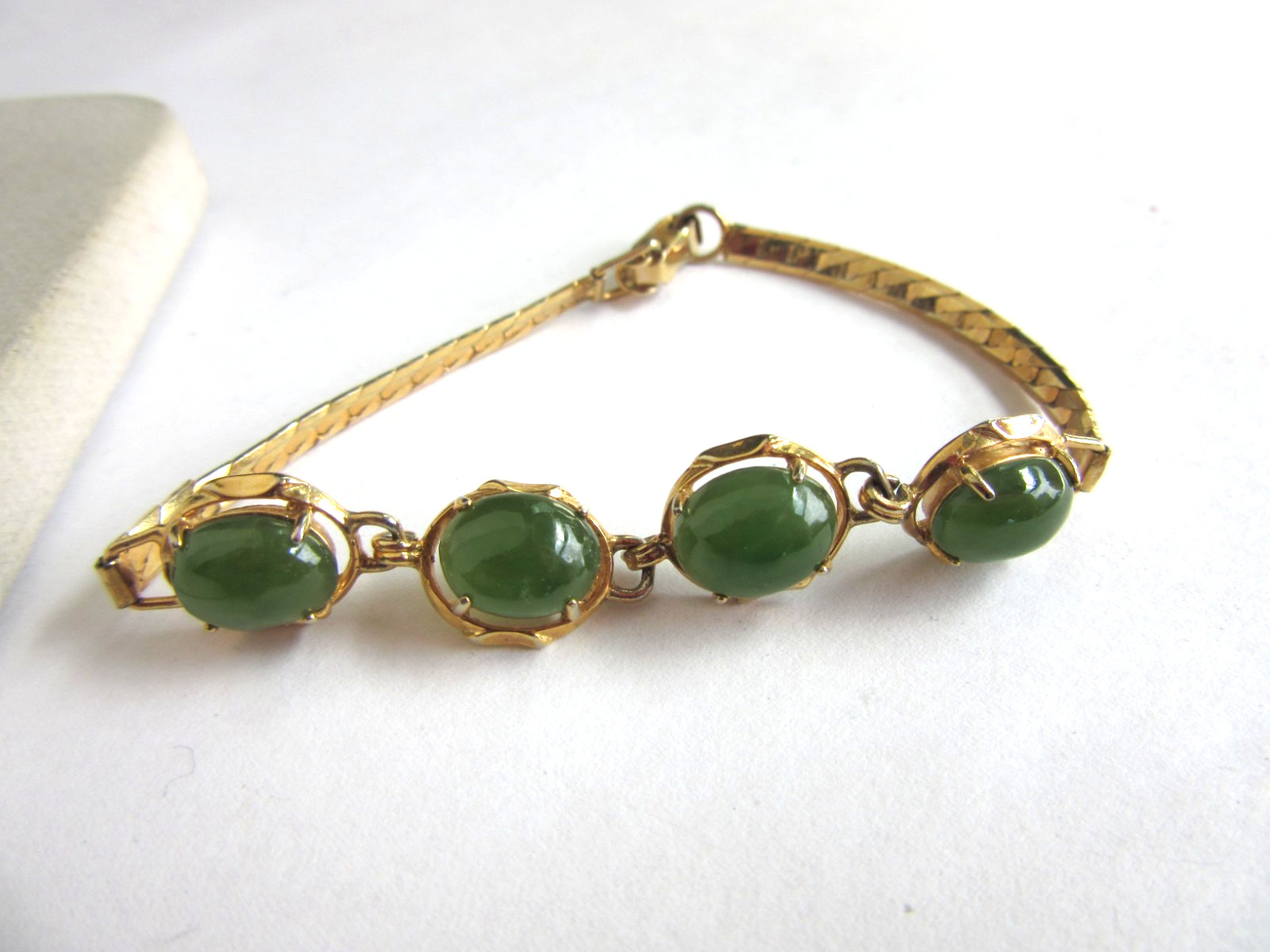 Vintage gold tone herringbone chain with 4 faux jade cab stones bracelet