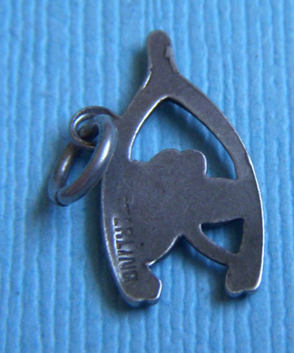 Vintage 40’s wishbone and clover lucky sterling charm
