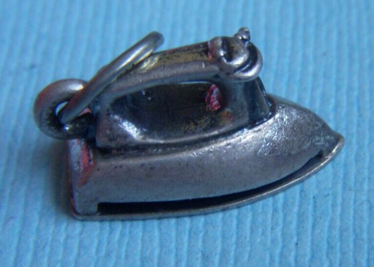 Vintage Beau iron sterling charm