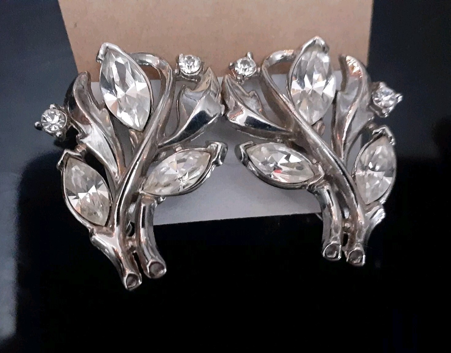 Vintage Crown Trifari rhodium plated marquise cut rhinestone clip on earrings