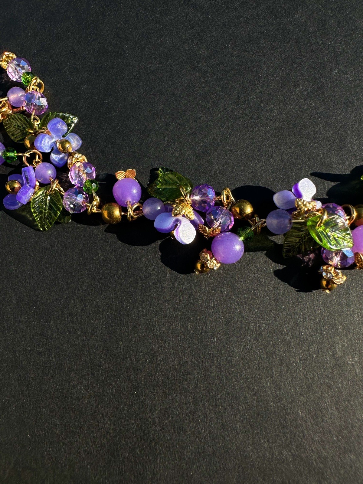 Gold Tone 7.5” Vintage Style – Green Leaf, Purple Flower Charm Bracelet.