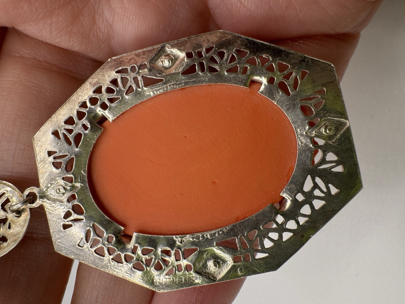 Antiqued ART DECO designed GERMANY faux Coral Carved Filigree Necklace Pendant