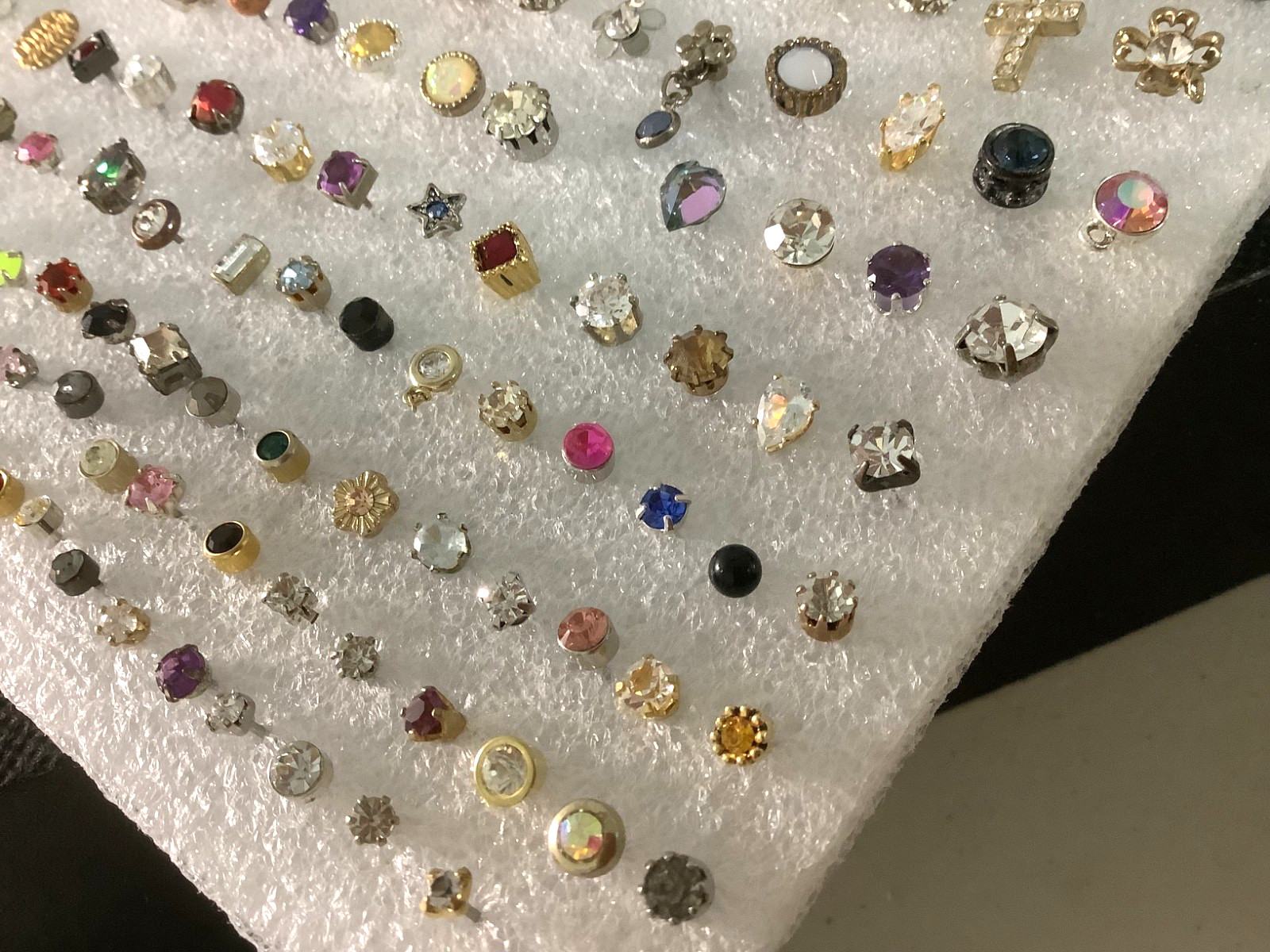 Huge lot of mixed vintage SINGLE stud earrings various unknown stones materials