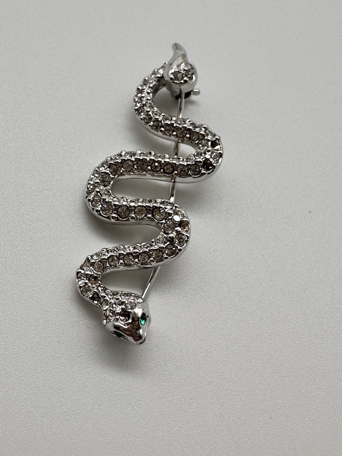 Vintage Swarovski Swan Silver tone Pave Crystal Snake brooch green eyes