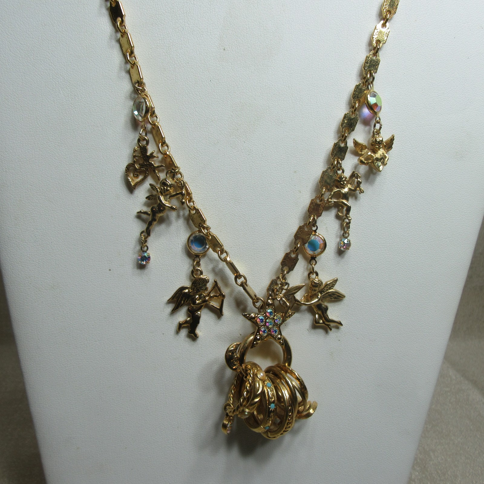 Vintage Goldtone Kirks Folly Seven Angels Charms and Ring Set