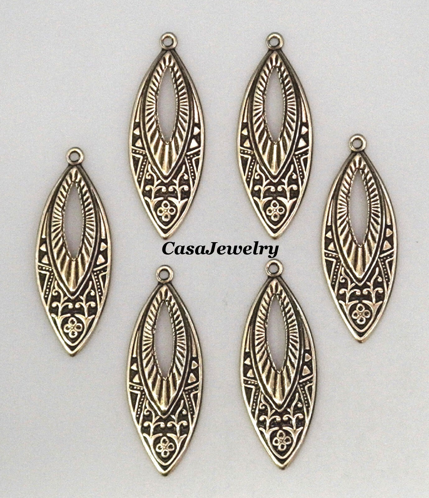 #0036 ANTIQUED GOLD OPEN CENTER TEARDROP W/TOP HANG RING – 6 Pc Lot