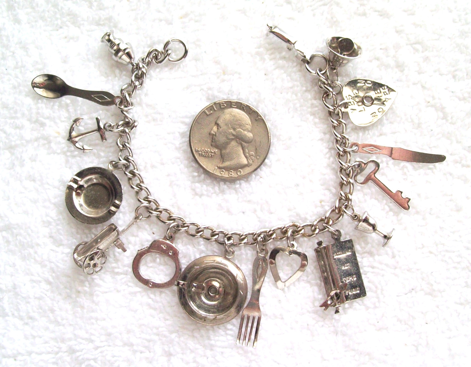Vintage Coro Bright Silver-Tone Charm Bracelet with 15 Charms