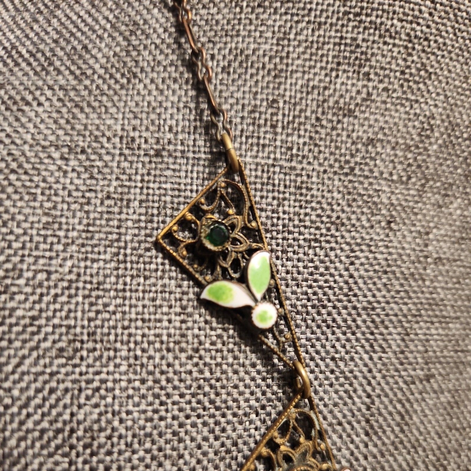 Vintage 1920’s transition style brass, enamel, green glass paste necklace