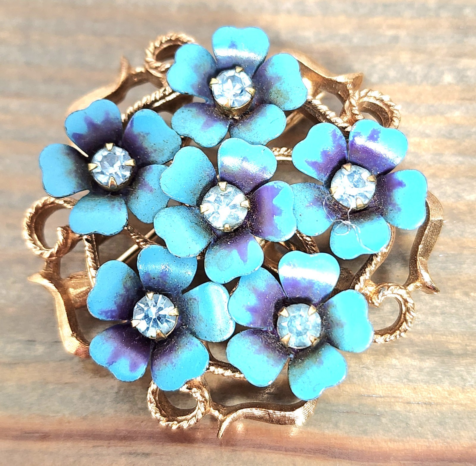 VTG Avon Gold Tone Forget Me Not Blue Enamel Rhinestone Rivet Swedge Brooch