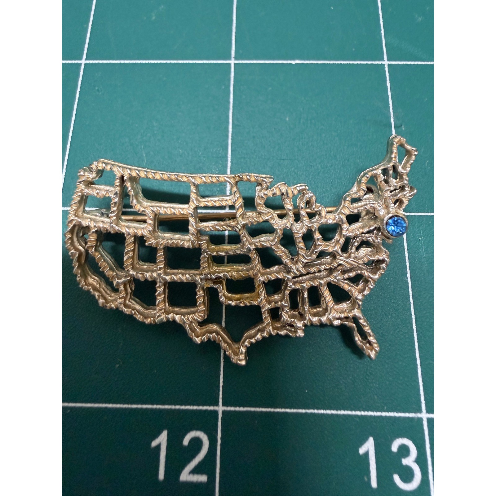 Vintage Goldish Tone USA Map Brooch Blue Rhinestone Patriotic United States Pin