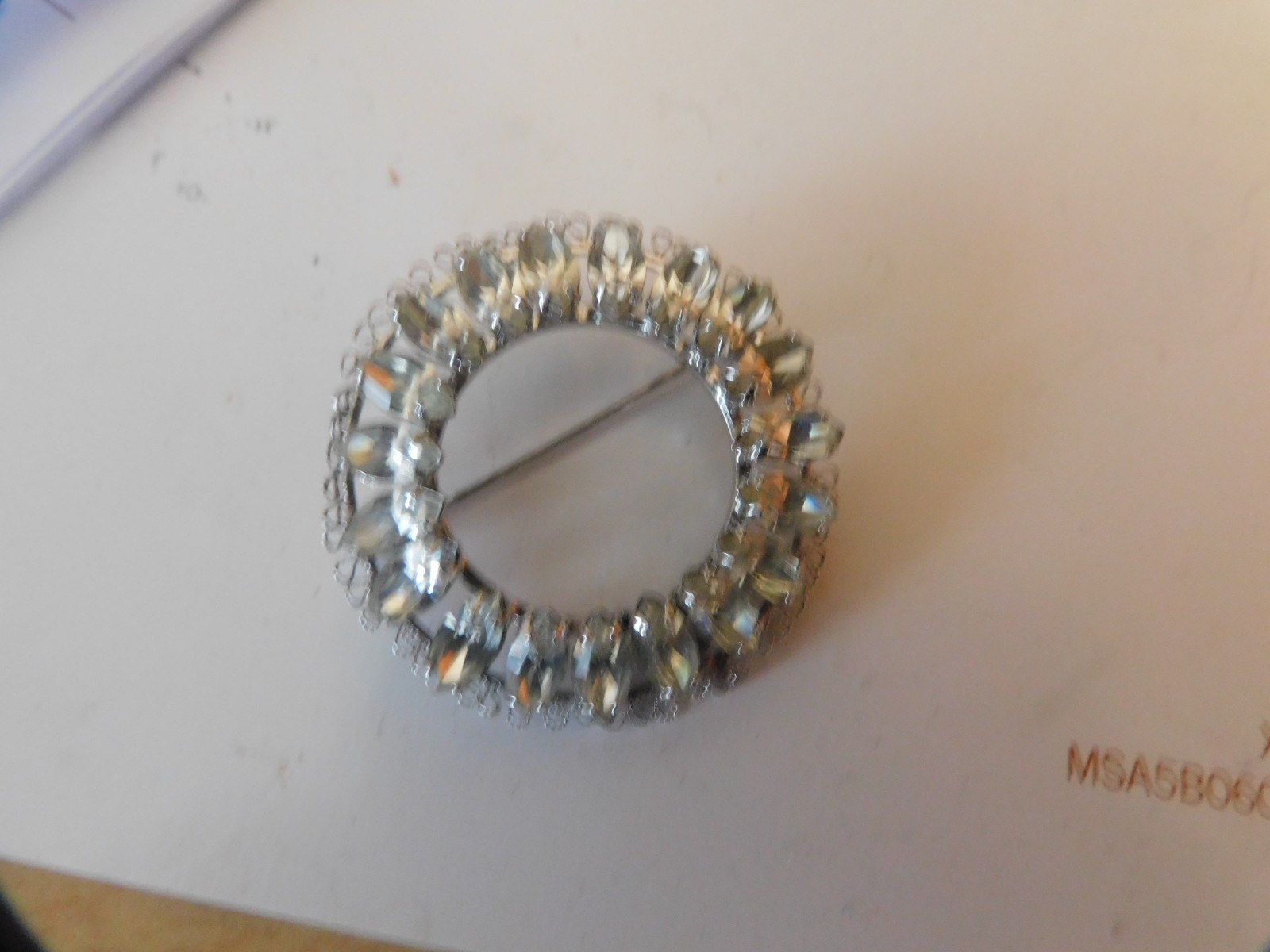vtg. stunning signed sterling rhinestone circle pin hand set .