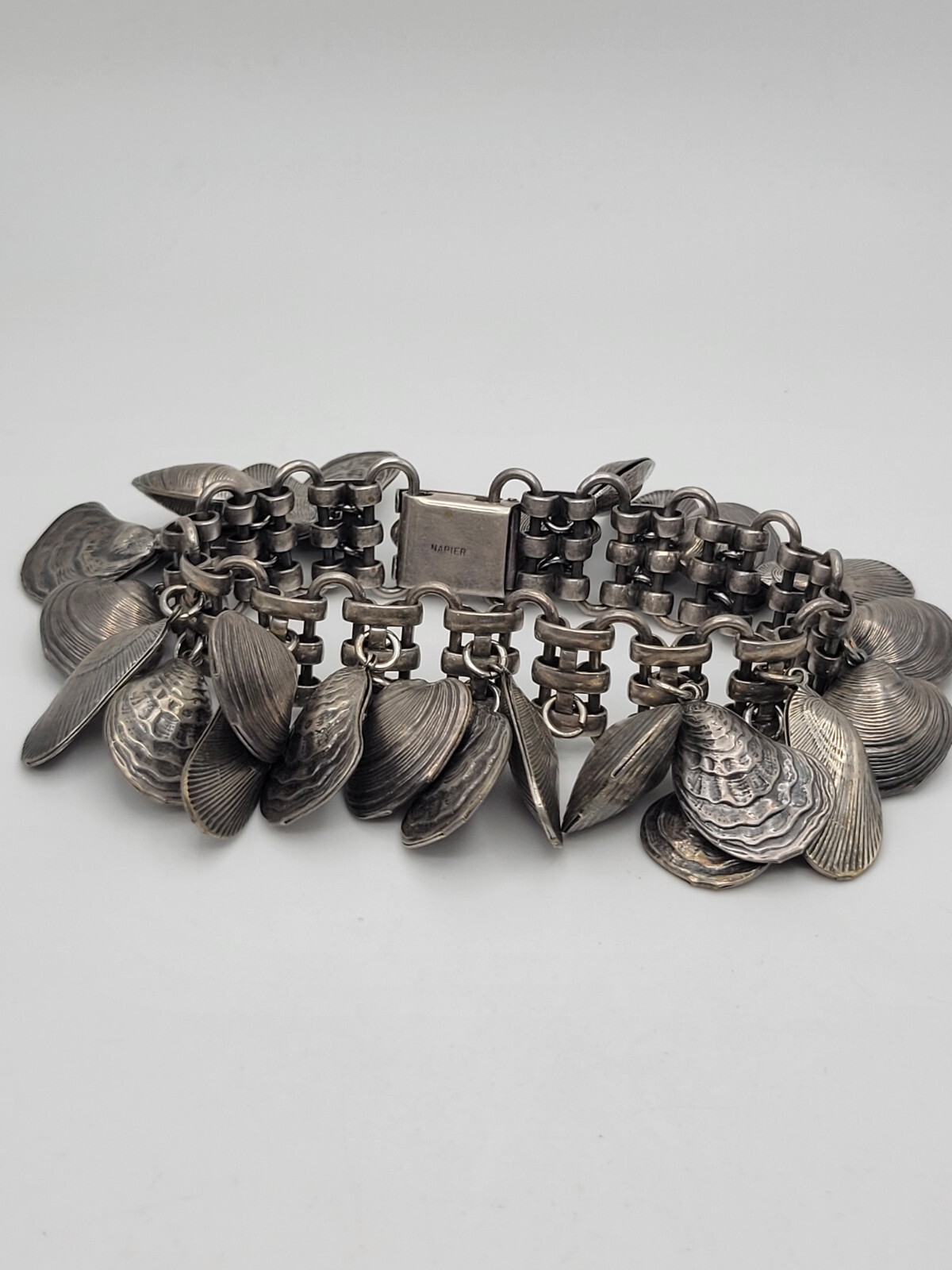 AS IS VINTAGE NAPIER EUGENE BARTOLLI SEASHELL CHARM BRACELET SILVER TONE