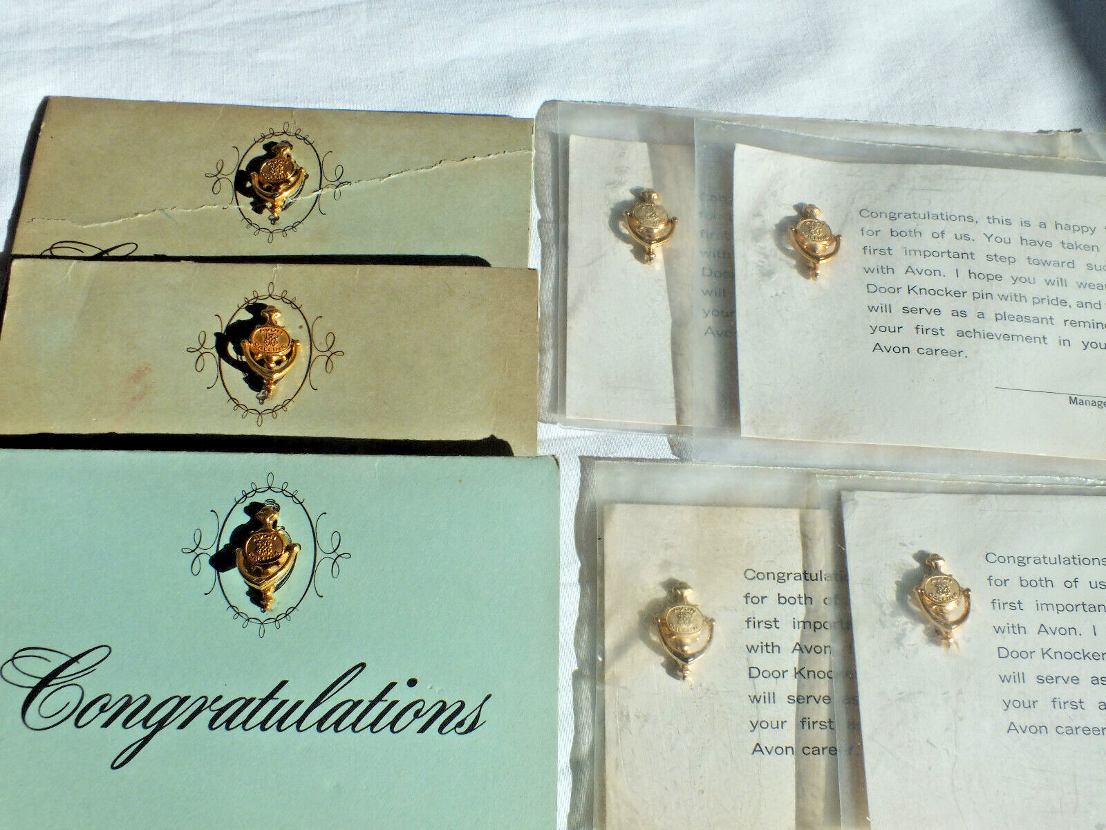 Avon calling DOOR KNOCKER PIN lot of 7 NOS vintage hinged 1970’s seller award