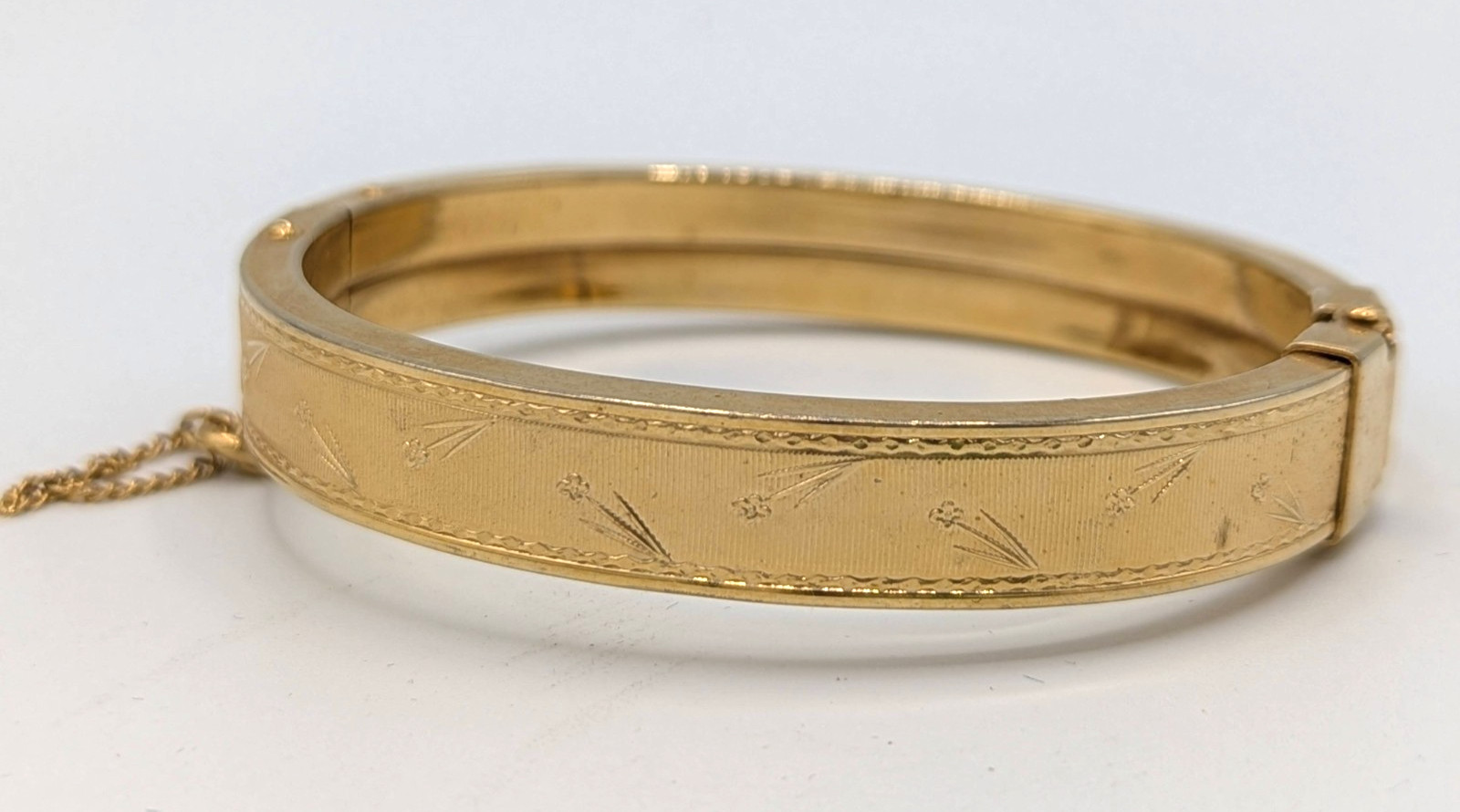 Vintage Etched Hinged Bangle Bracelet Flowers Gold Tone MCM Safety Chain 7.25″