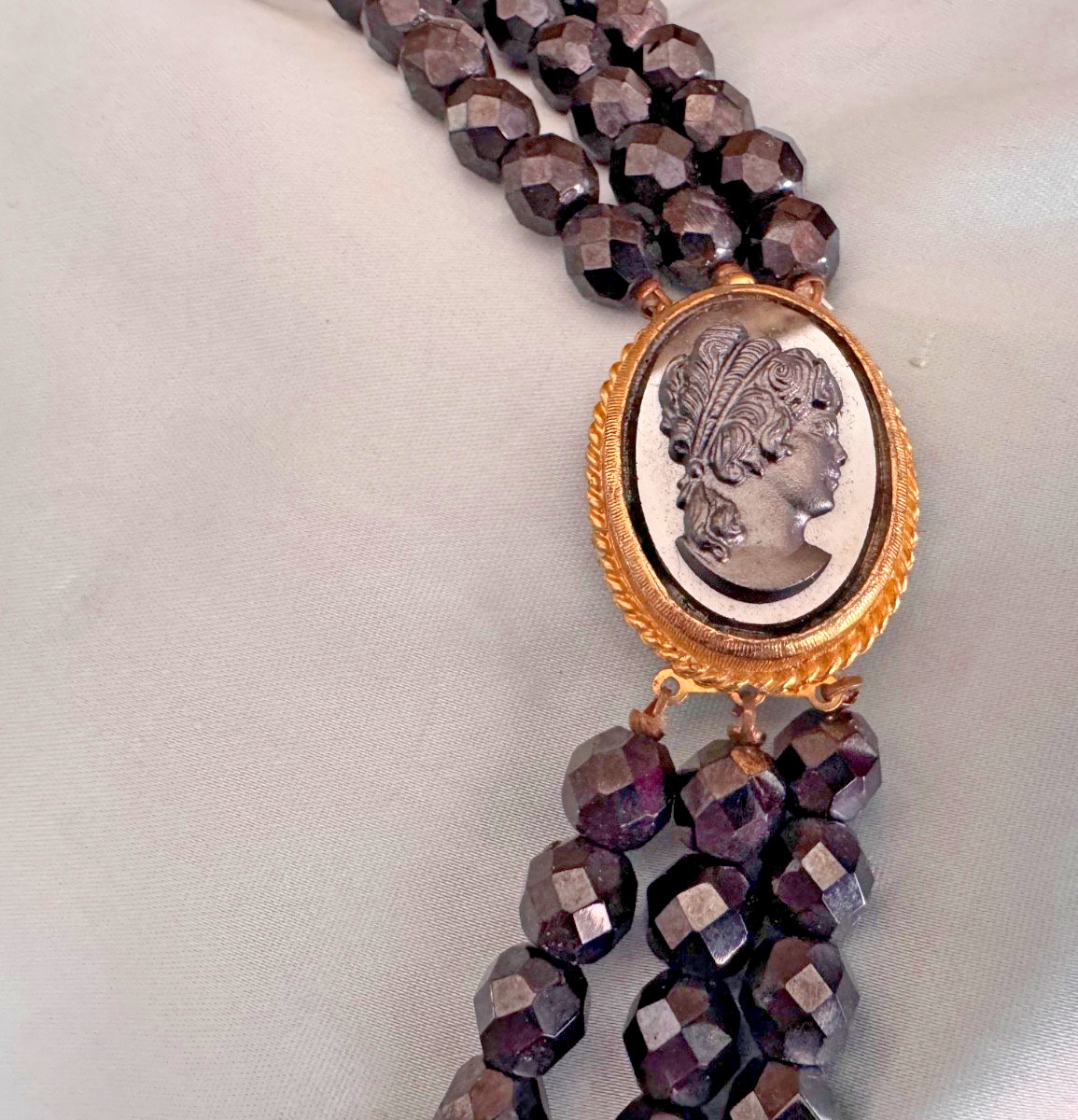 Vintage Necklace THREE STRAND FACETED CRYSTAL BEADS AND HEMATITE OVAL CAMEO 22″