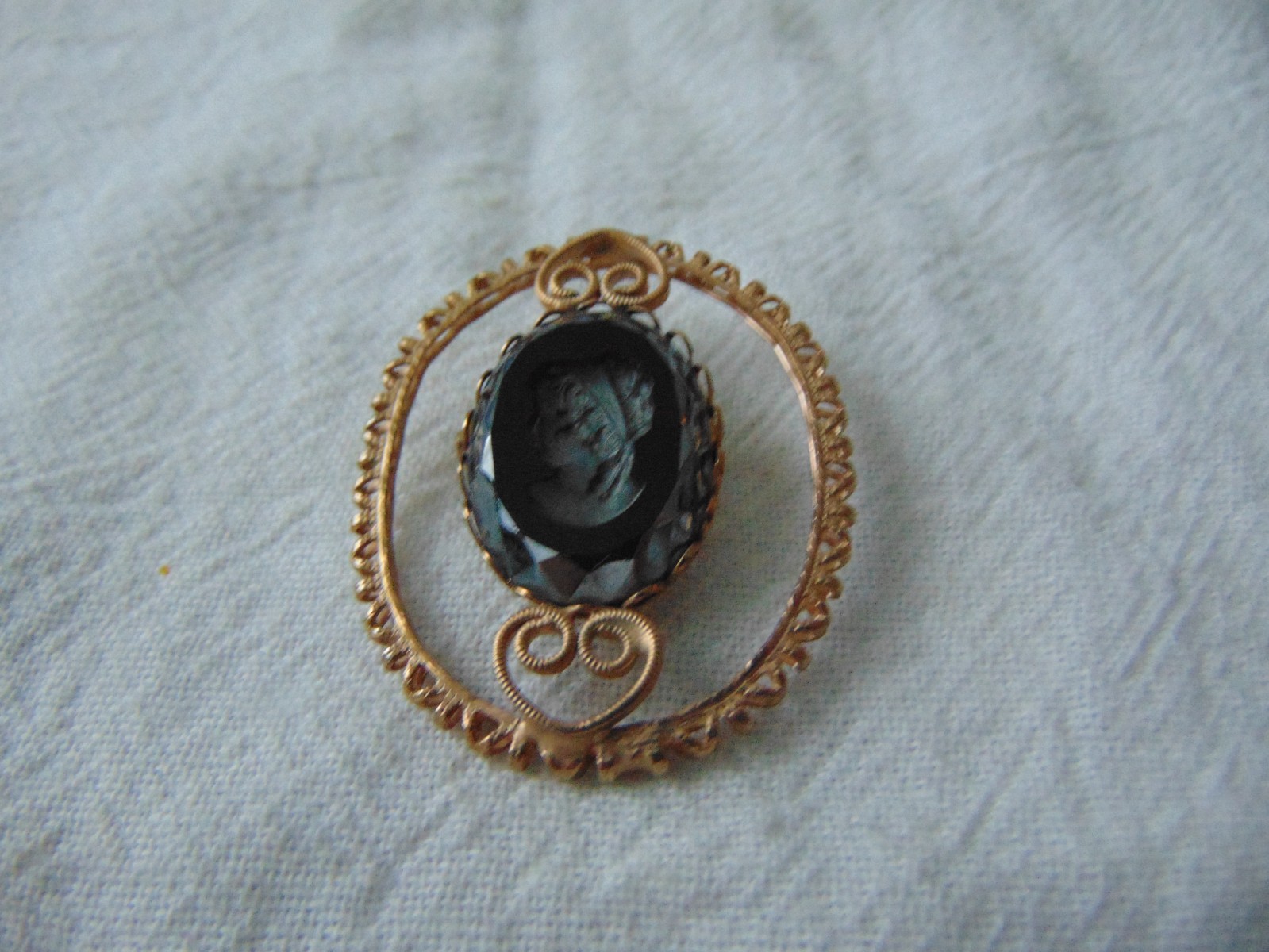 vintage antique gold plated cut out carved hematite intaglio cameo brooch