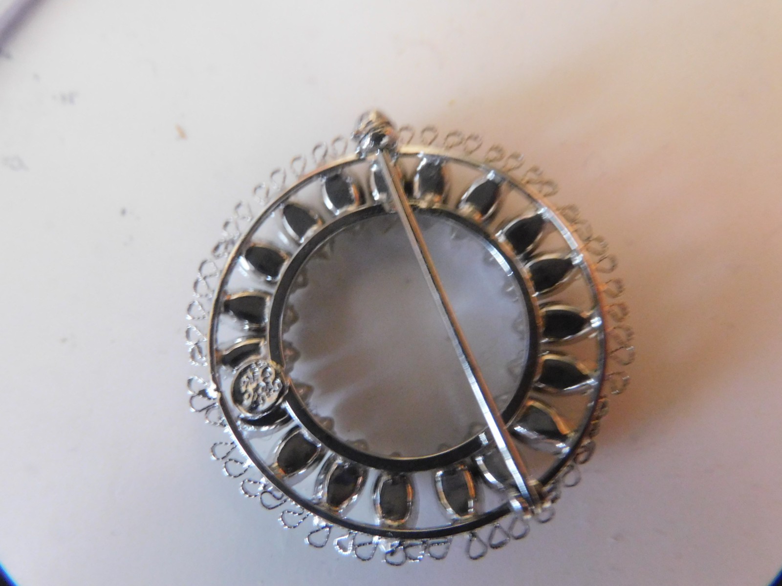vtg. stunning signed sterling rhinestone circle pin hand set .