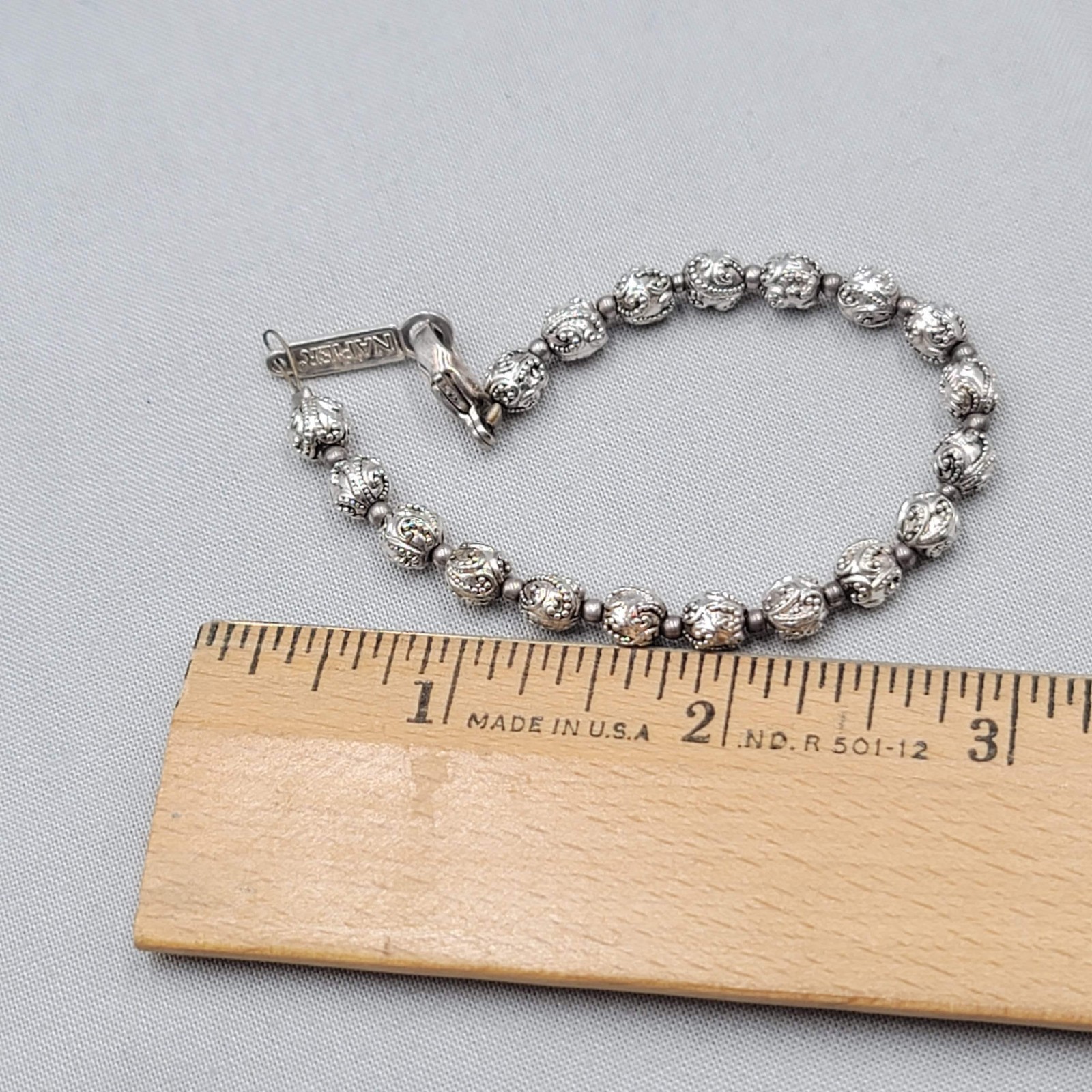Vintage Napier Embossed Silver tone Bead Bracelet 6.75″