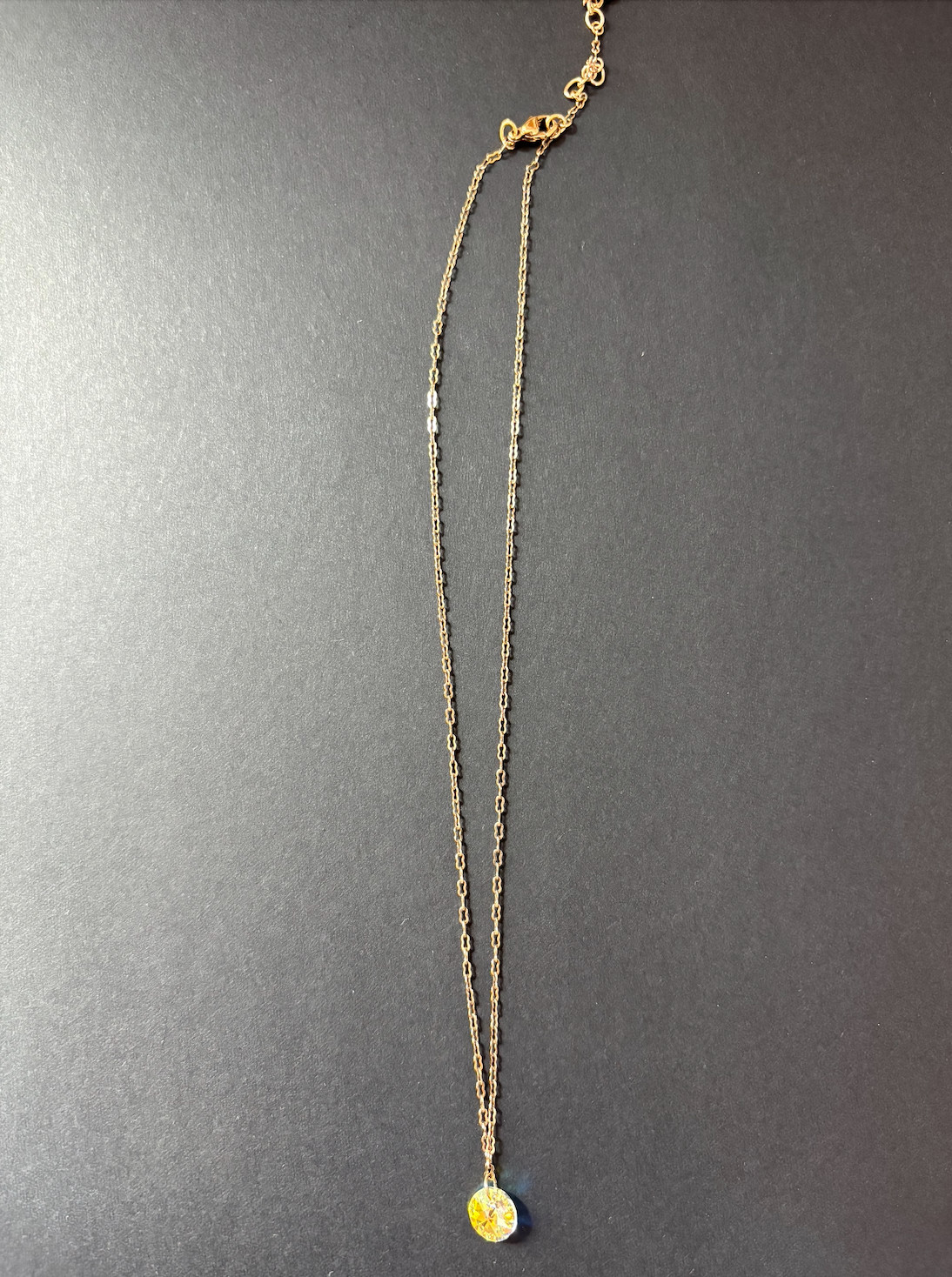 Swarovksi necklace with iridescent pendant on gold chain