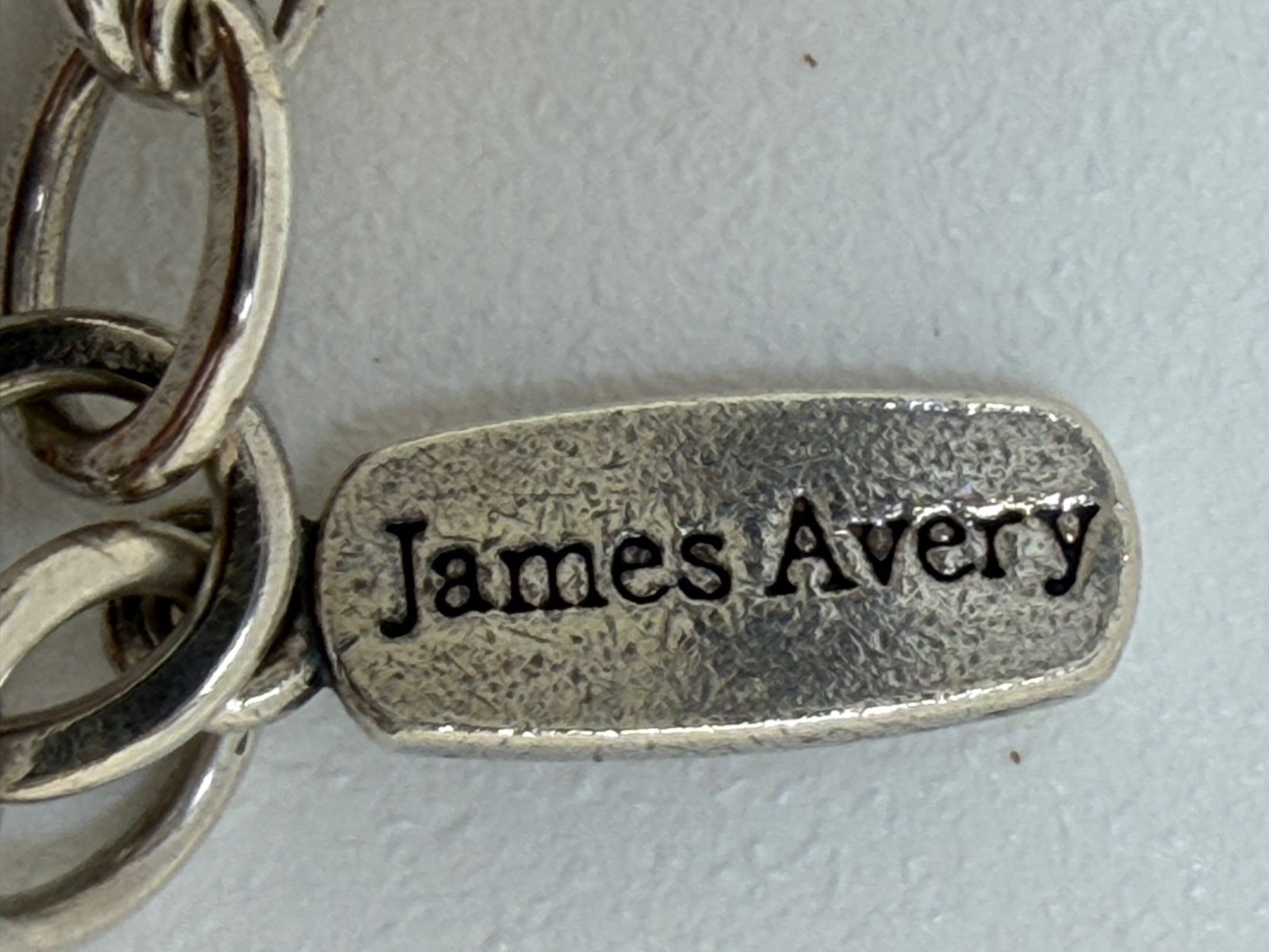 James Avery Sterling silver Charm bracelet with 6 Charms 7.5 Inch. 18+ Grams.