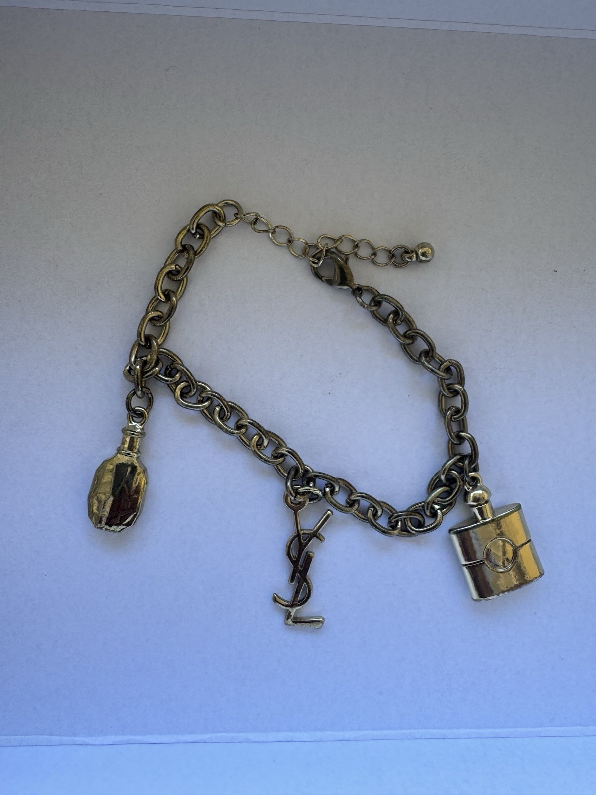 YSL Yves Saint Laurent Vintage 3 Charms Gold Tone Bracelet with Iconic Logo