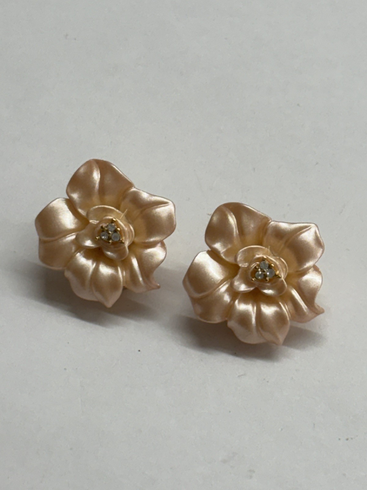 Vintage Signed NOLAN MILLER Cream Color Flower Clip Earrings W/Rhinestone Center