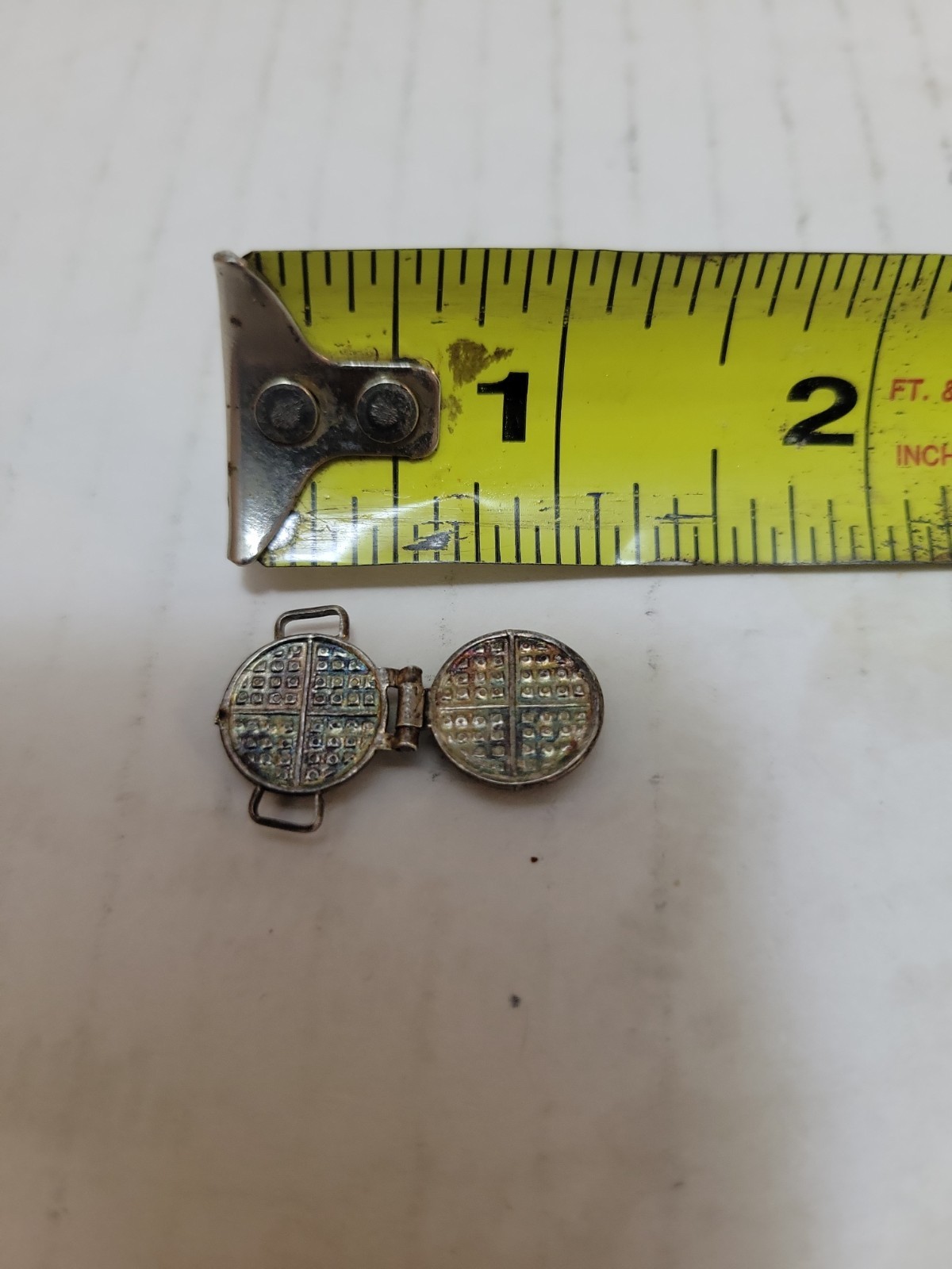 Vintage movable waffle iron sterling charm.