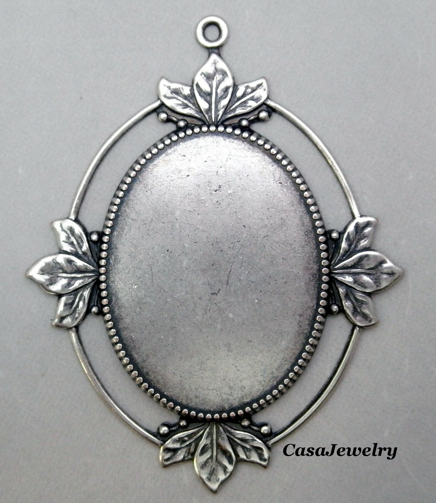 #1820 ANTIQUED STERLING SILVER PLATED 40×30 LEAF BORDER BEZEL W/TOP RING – 1 Pc