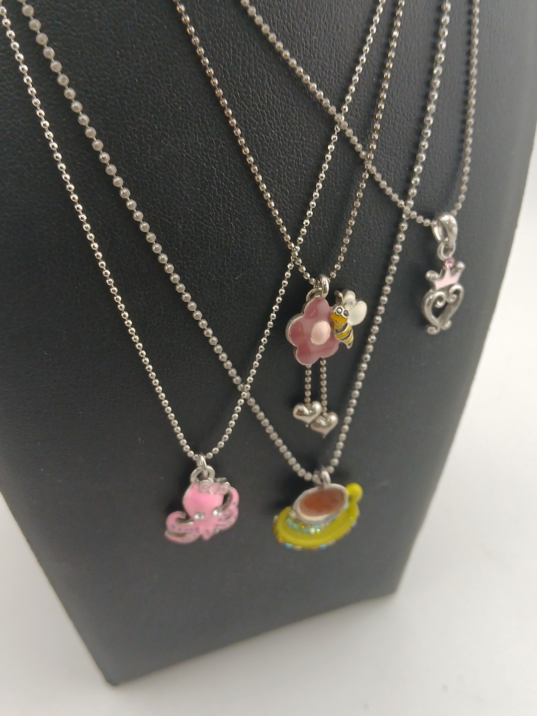 New Old Stock lot of 4 COOKIE LEE silver tone assorted figural pendant necklaces