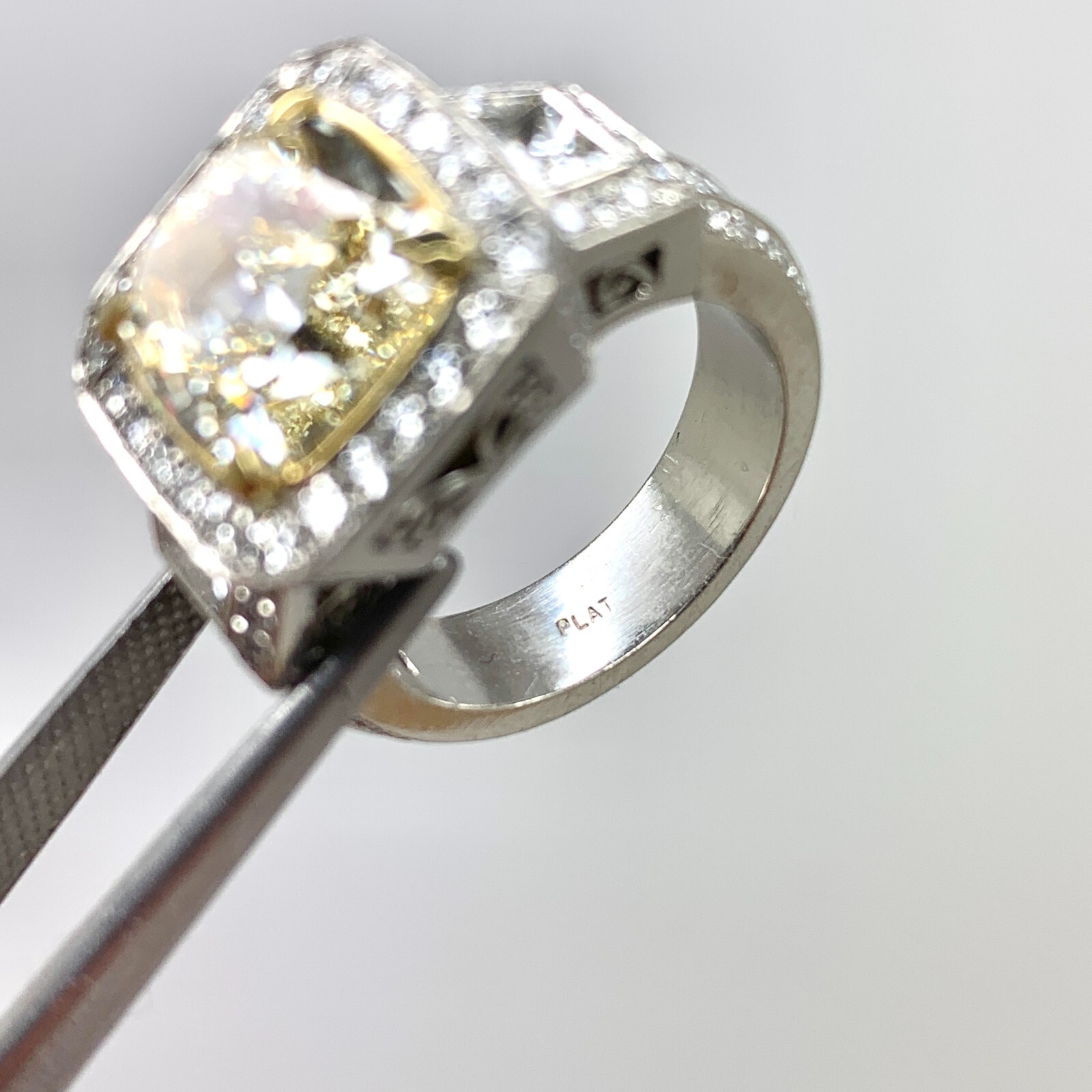 5.03 ct Fancy Light Yellow Diamond & 2.41 White Diamonds Platinum Ring