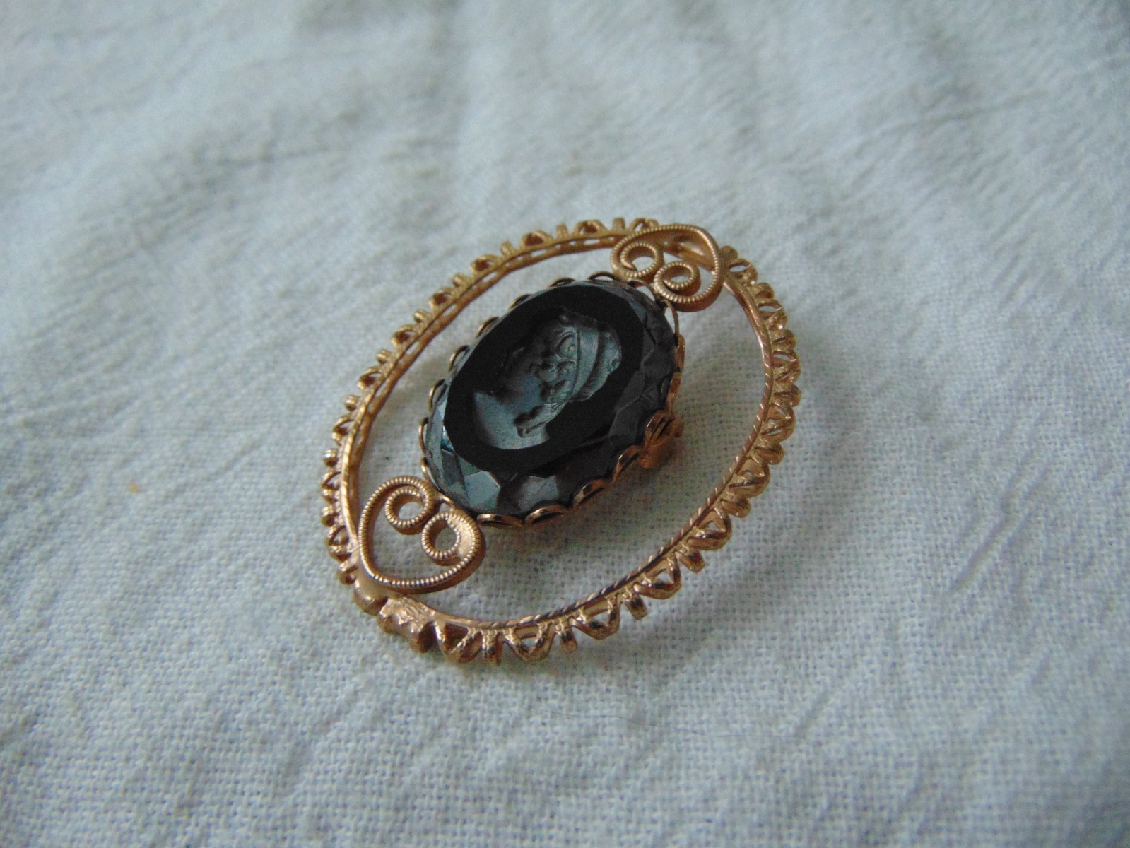 vintage antique gold plated cut out carved hematite intaglio cameo brooch
