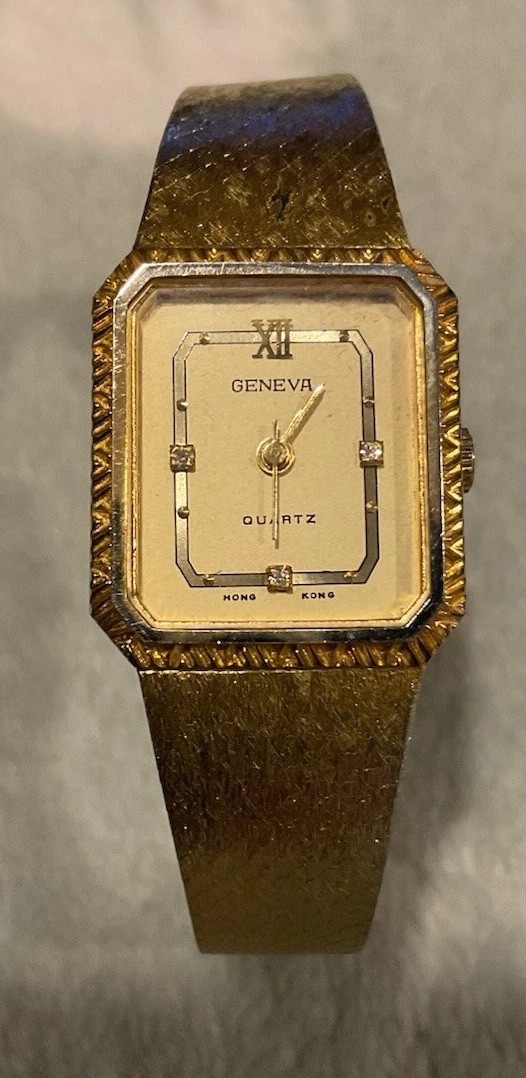 Vintage Geneva Quartz Wristwatch Gold Tone Case And Band