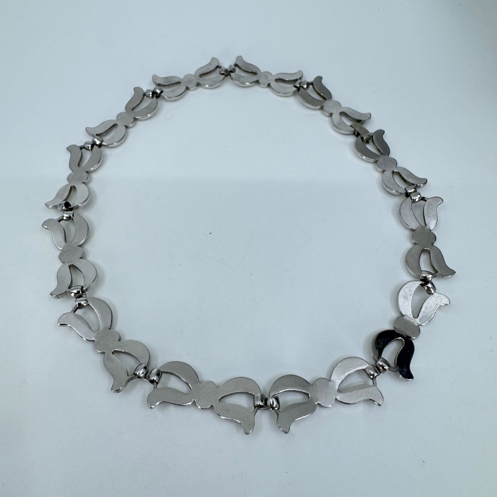 Monet Vintage Silver Tone Scroll Link Collar Necklace 15 Inch Bow Design