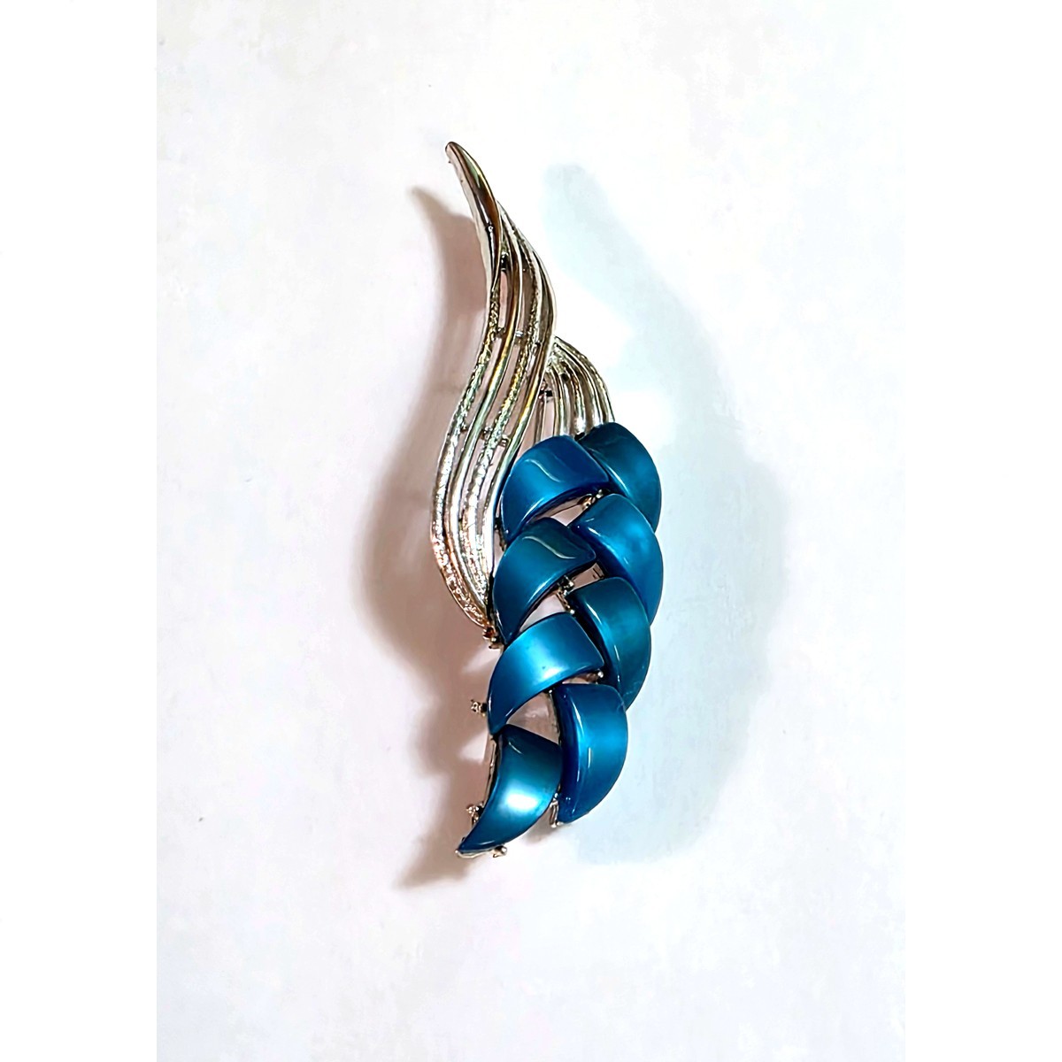 Thermoset Lucite brooch – marked, blue silver 4″ moonglow