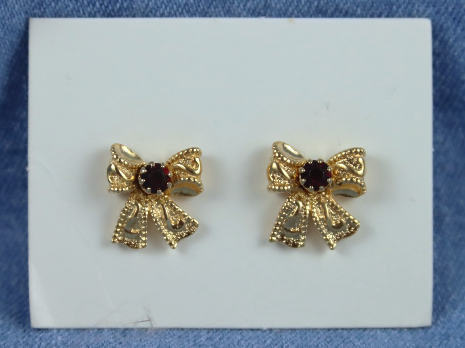 Vintage 1991 Avon Birthday Bow Pierced Earrings July-Simulated Ruby Convertible