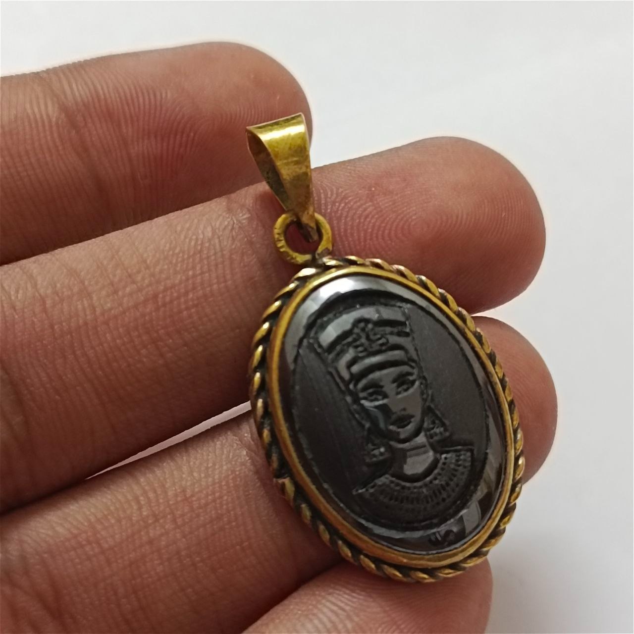 Vintage copper pendant with hematite stone, engraved Egyptian Queen design