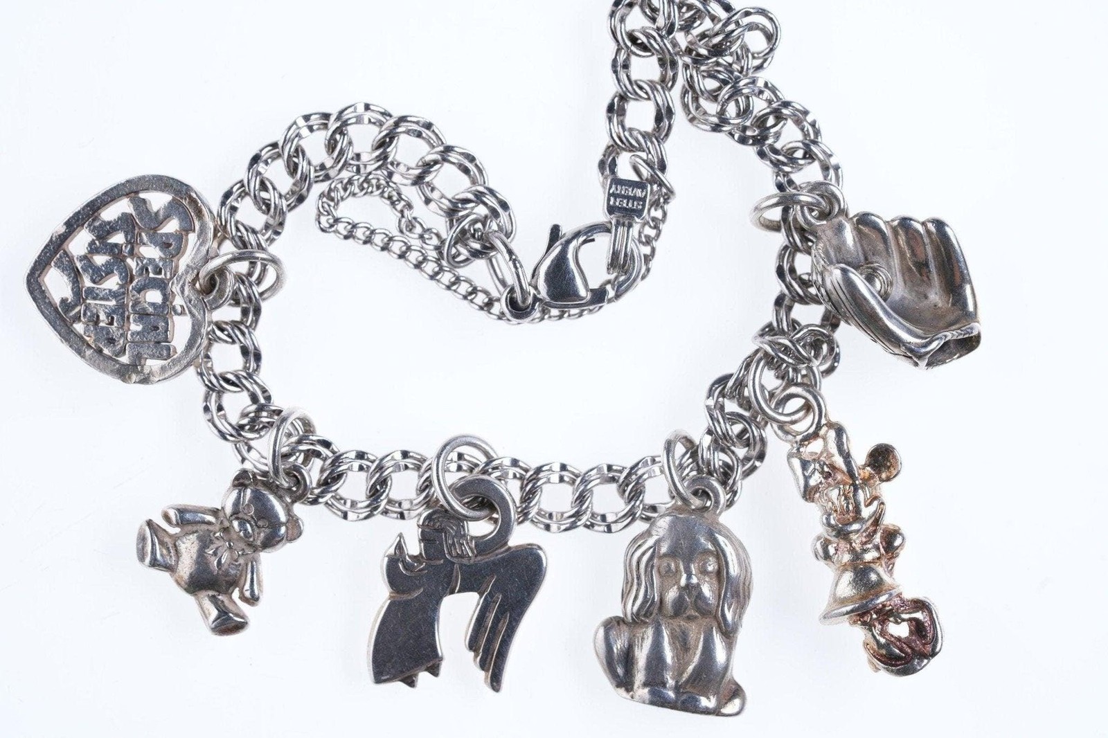 6.75″ James Avery Sterling silver Charm bracelet with lots of charms
