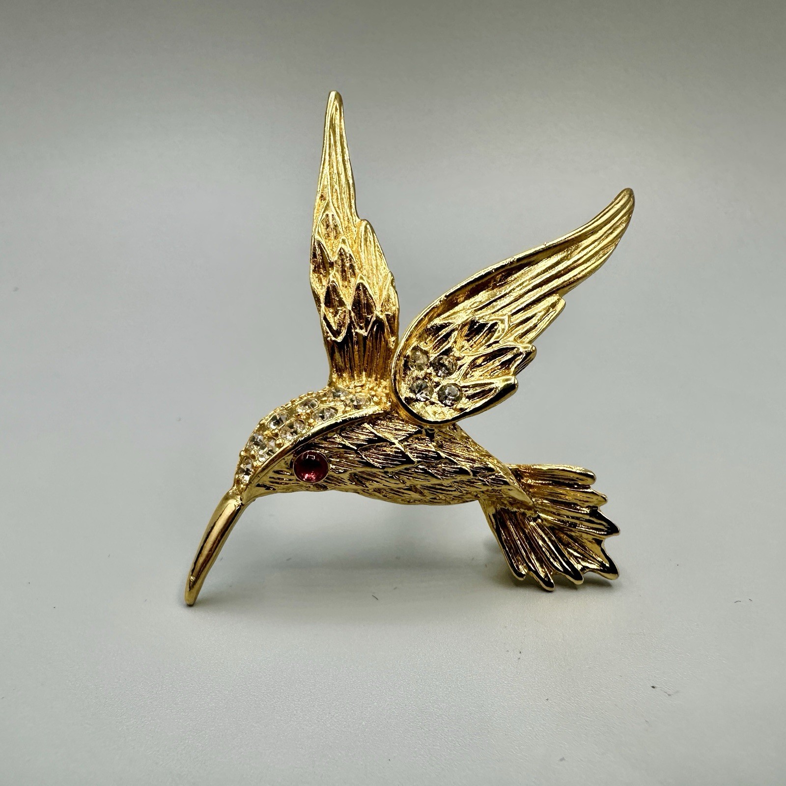 Vintage Hummingbird In Flight Brooch Pin Gold Tone Clear Rhinestones Red Eye 3D