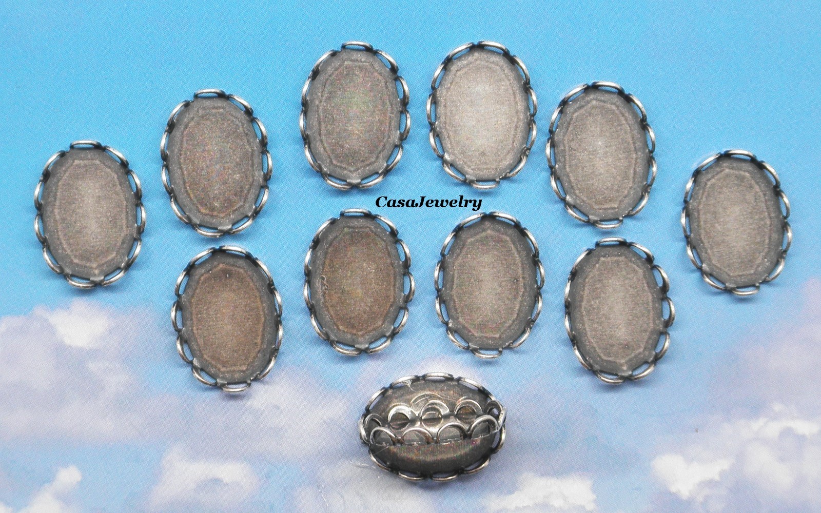 #1156 ANTIQUED .925 STERLING SILVER PLATED LACE BORDER 14x10mm BEZEL – 12 pcs