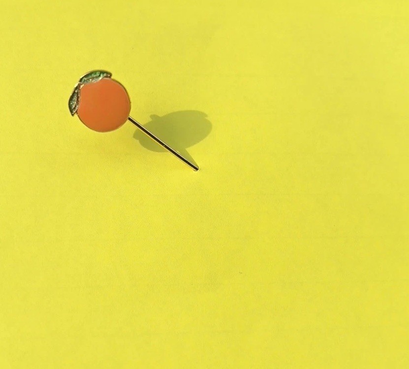 A Happy Vintage Orange Stickpin
