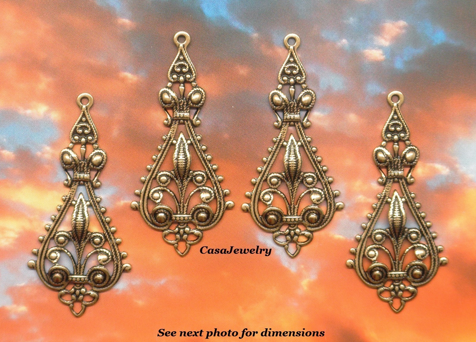 #0009 ANTIQUED GOLD OPEN FILIGREE TEARDROP W/TOP HANG RING – 4 Pcs