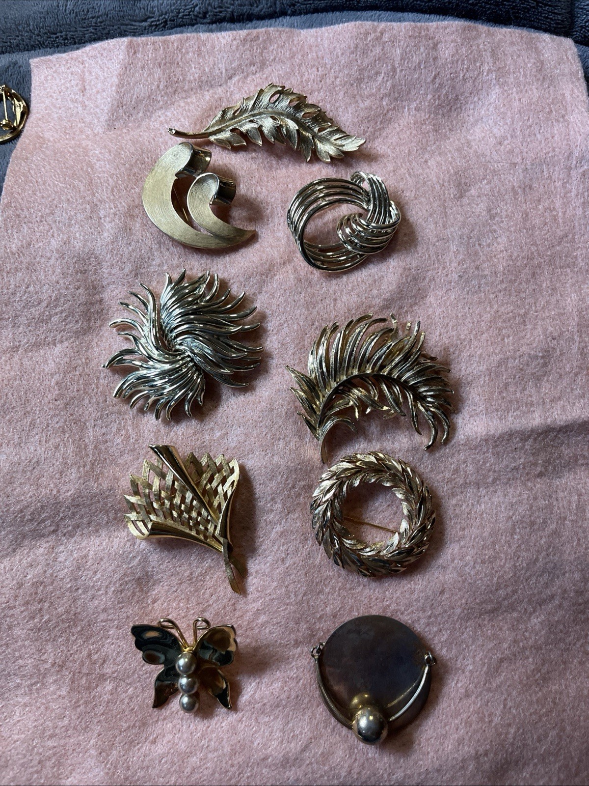 9 Vintage Signed Gold Toned Brooches (Coro, Kramer, Tifari)