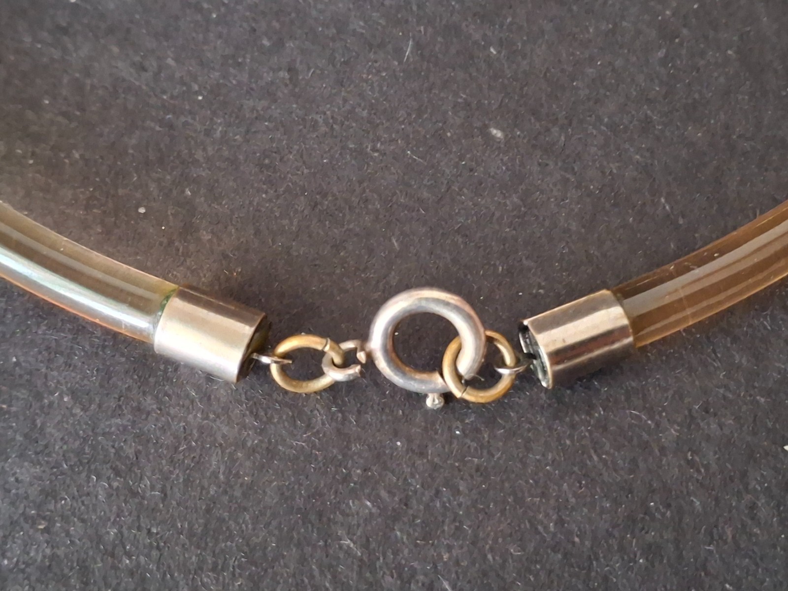 Aarikka Finland necklace with a vibrant red wooden ring pendant