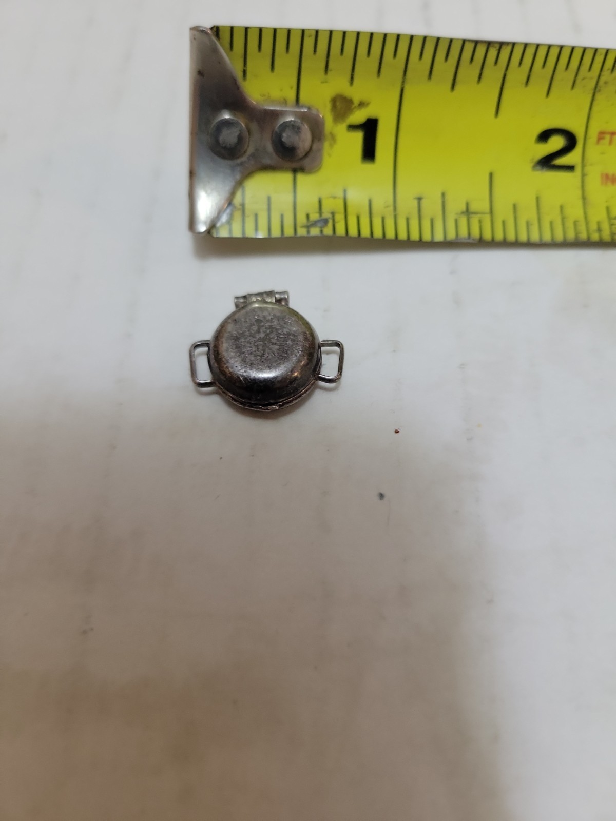 Vintage movable waffle iron sterling charm.