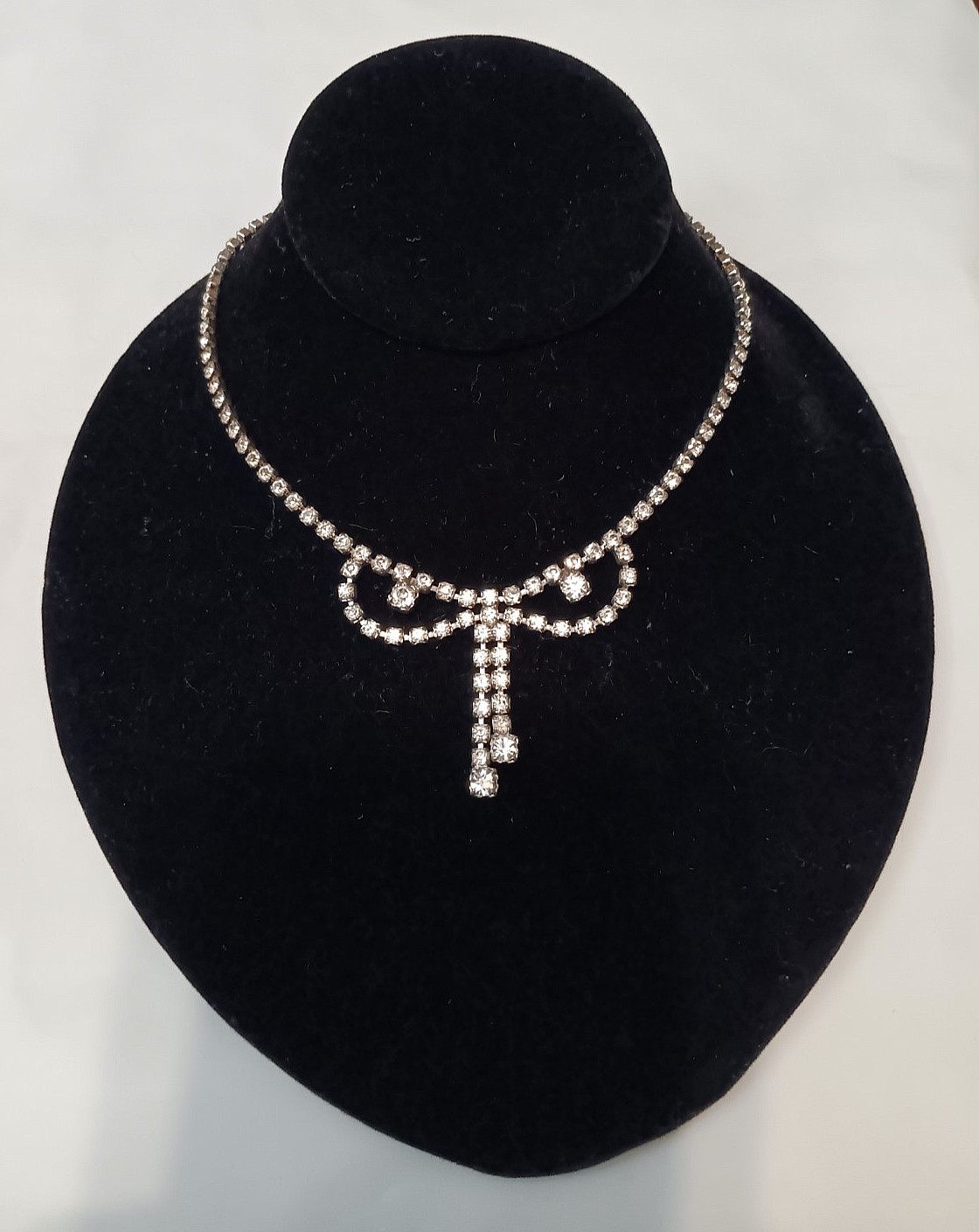 vintage 1950’s silver tone rhinestone dangle bow Tie necklace