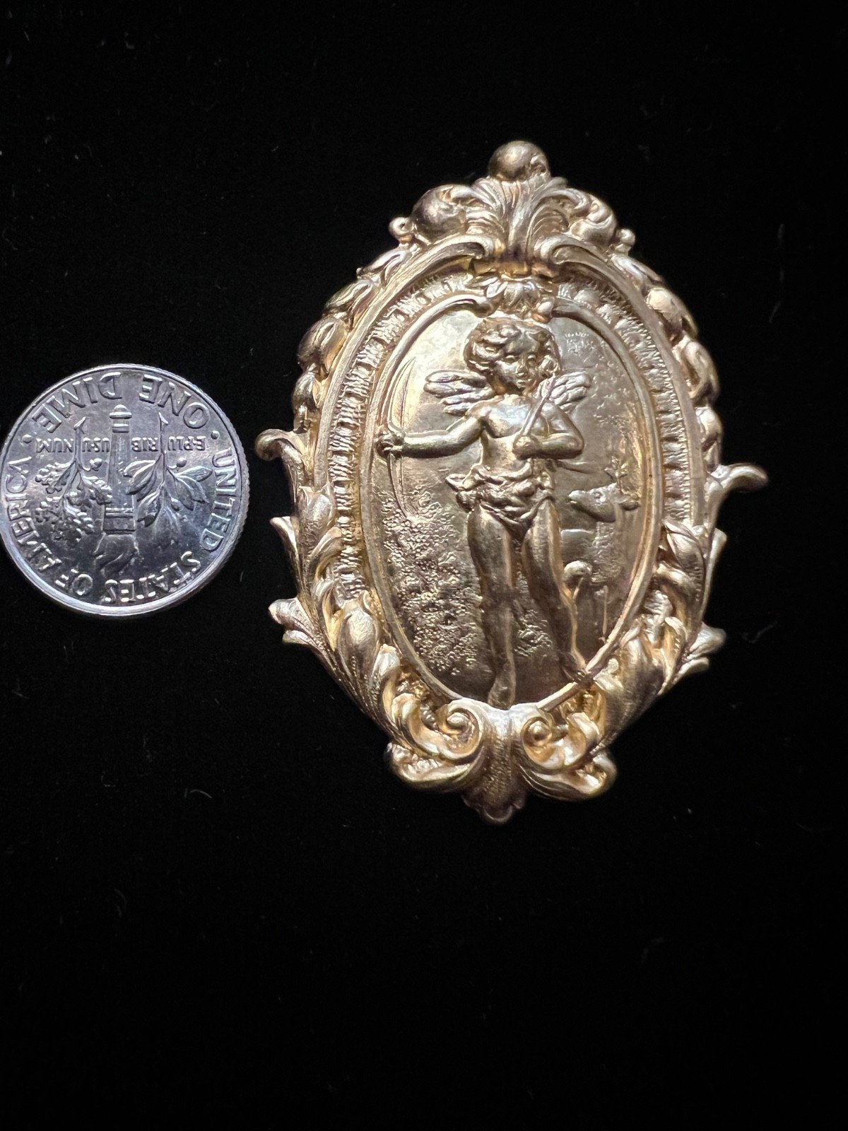 Vintage brass stamping. Cherub design. Victorian Antique from famous manufacture
