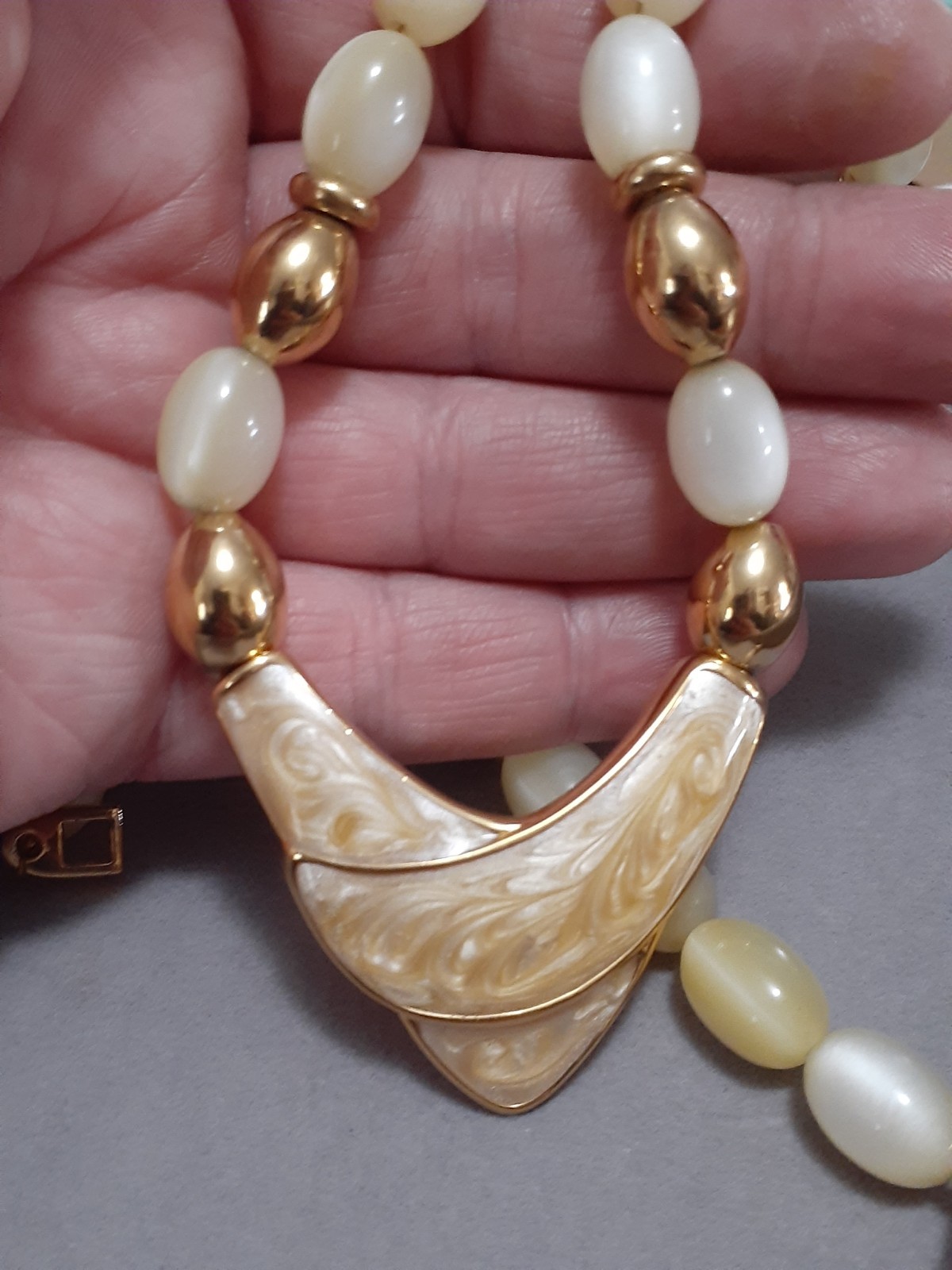 Napier champagne moonglow lucite bead necklace w/Chevron enamel pendant 24″